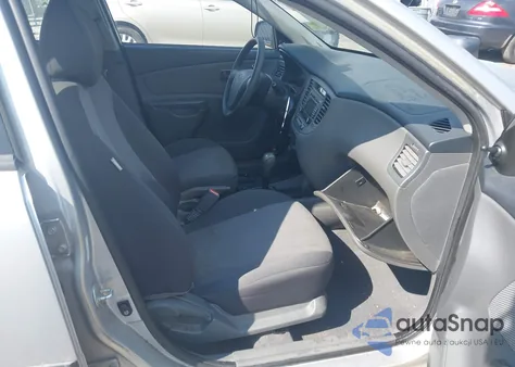 2009 Kia Rio Lx z USA, uszkodzony, nr VIN KNADE223296459124